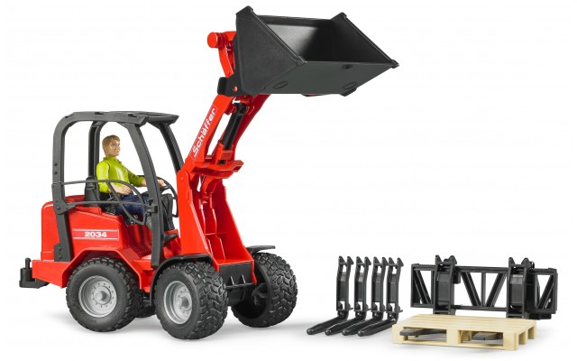 Игрушка Bruder погрузчик Schaffer Compact 2034 с фигуркой, вилами и поддоном (02191) 