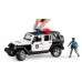 Игрушка Bruder внедорожник Jeep Wrangler с фигуркой полицейского (02527) title=