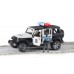 Игрушка Bruder внедорожник Jeep Wrangler с фигуркой полицейского (02527) title=