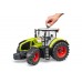 Іграшка трактор Claas Axion 950 зі снігоочисником і ланцюгами Bruder 03017 title=