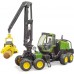 Игрушка Bruder лесной Харвестер John Deere 1270G со стволом дерева (02135) title=